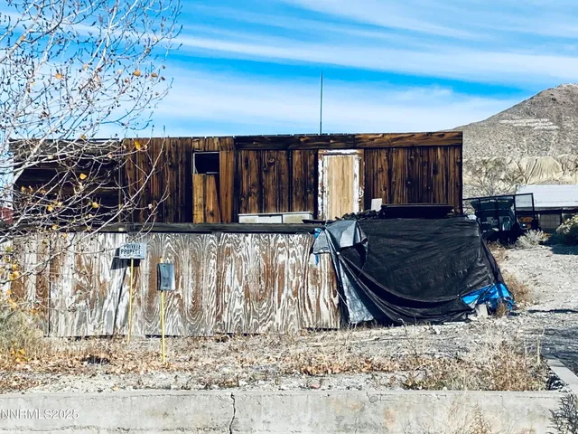 a view of a backyard of a house