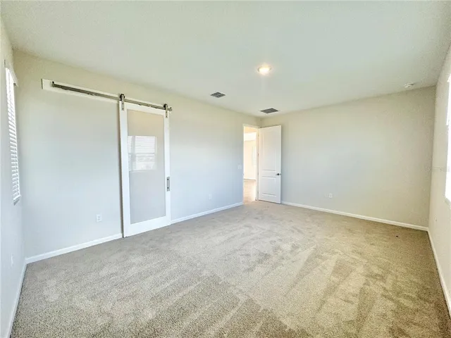 a bathroom with a sink a mirror and a shower
