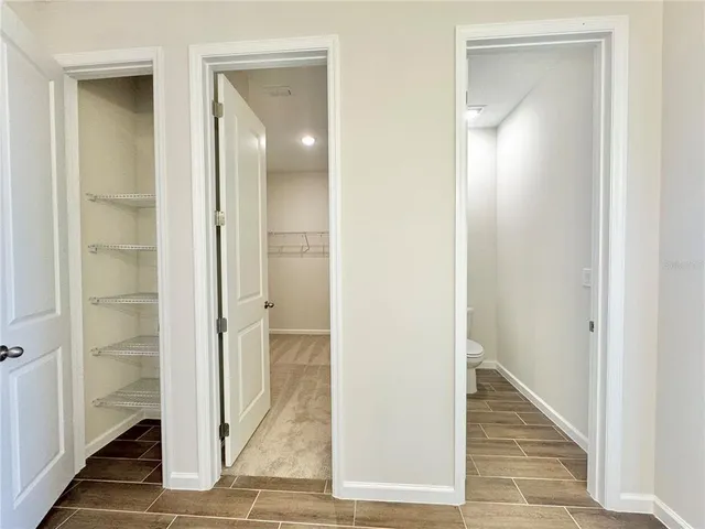 a view of a room with racks on the wall