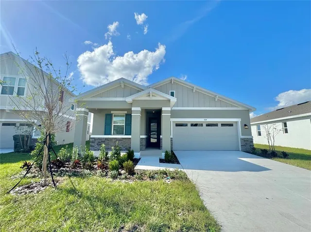 a bed room with a bed and a window