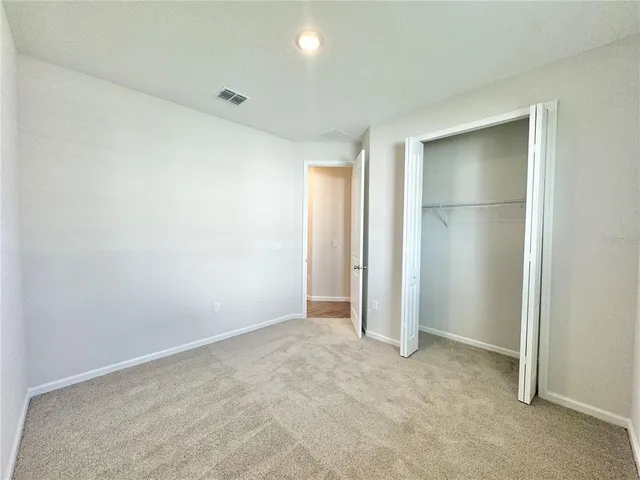 a view of a bathroom with a tub and shower