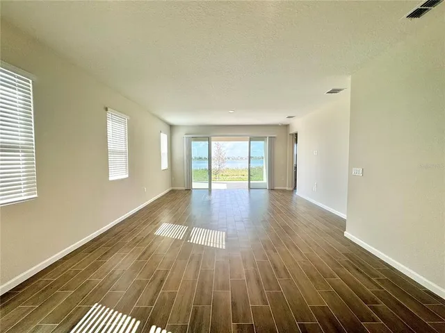 a view of a big room with a big yard