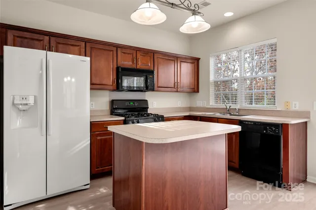 a view of livingroom with furniture wooden floor and window