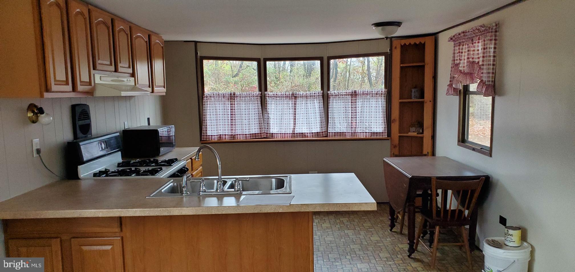 24 Waterloo Road Carlisle, PA 17015 - Photo 4 of 9 a view of a workspace with furniture and a window