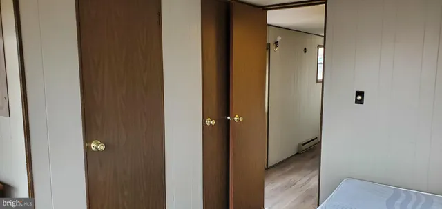 a view of a bathroom from the hallway