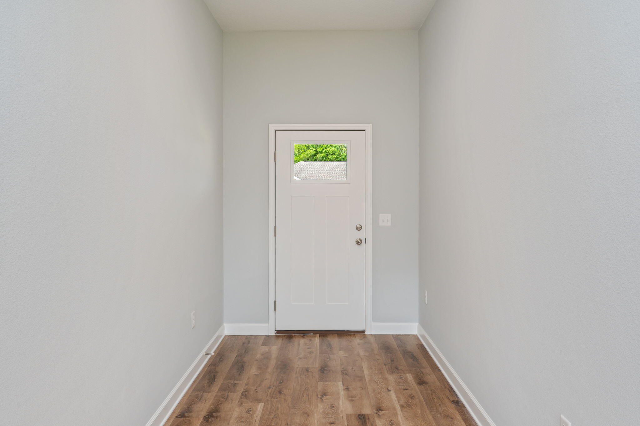 3863 Poverty Creek Road Crestview, FL 32539 - Photo 2 of 31 a view of an empty room with closet and a window