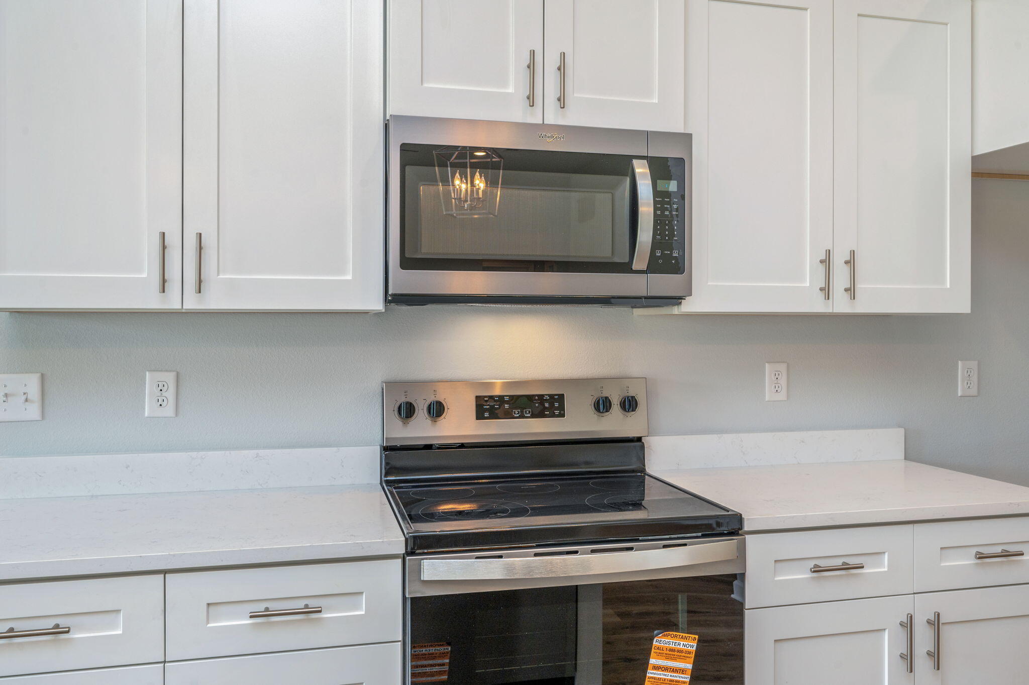 3863 Poverty Creek Road Crestview, FL 32539 - Photo 10 of 31 a kitchen with appliances a stove and cabinets