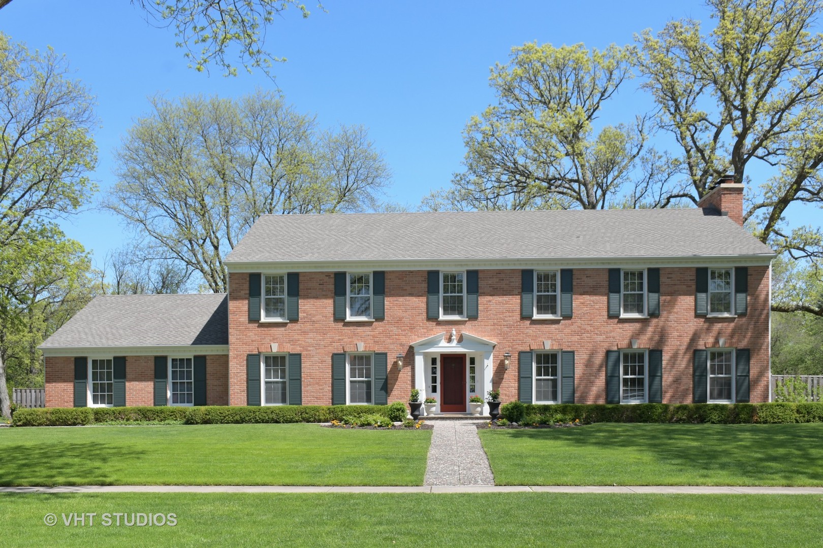 1350 Inverlieth Road Lake Forest, IL 60045 - Photo 1 of 43 a front view of a house with a garden