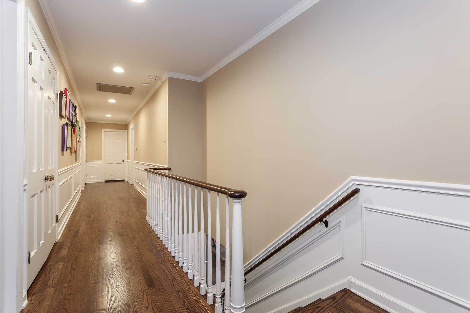 1350 Inverlieth Road Lake Forest, IL 60045 - Photo 18 of 43 a view of a hallway with wooden floor and staircase