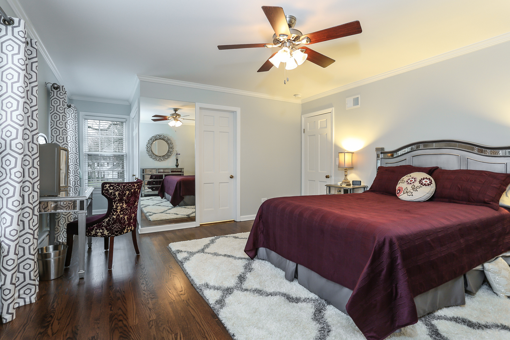 1350 Inverlieth Road Lake Forest, IL 60045 - Photo 26 of 43 a bedroom with a bed and wooden floor