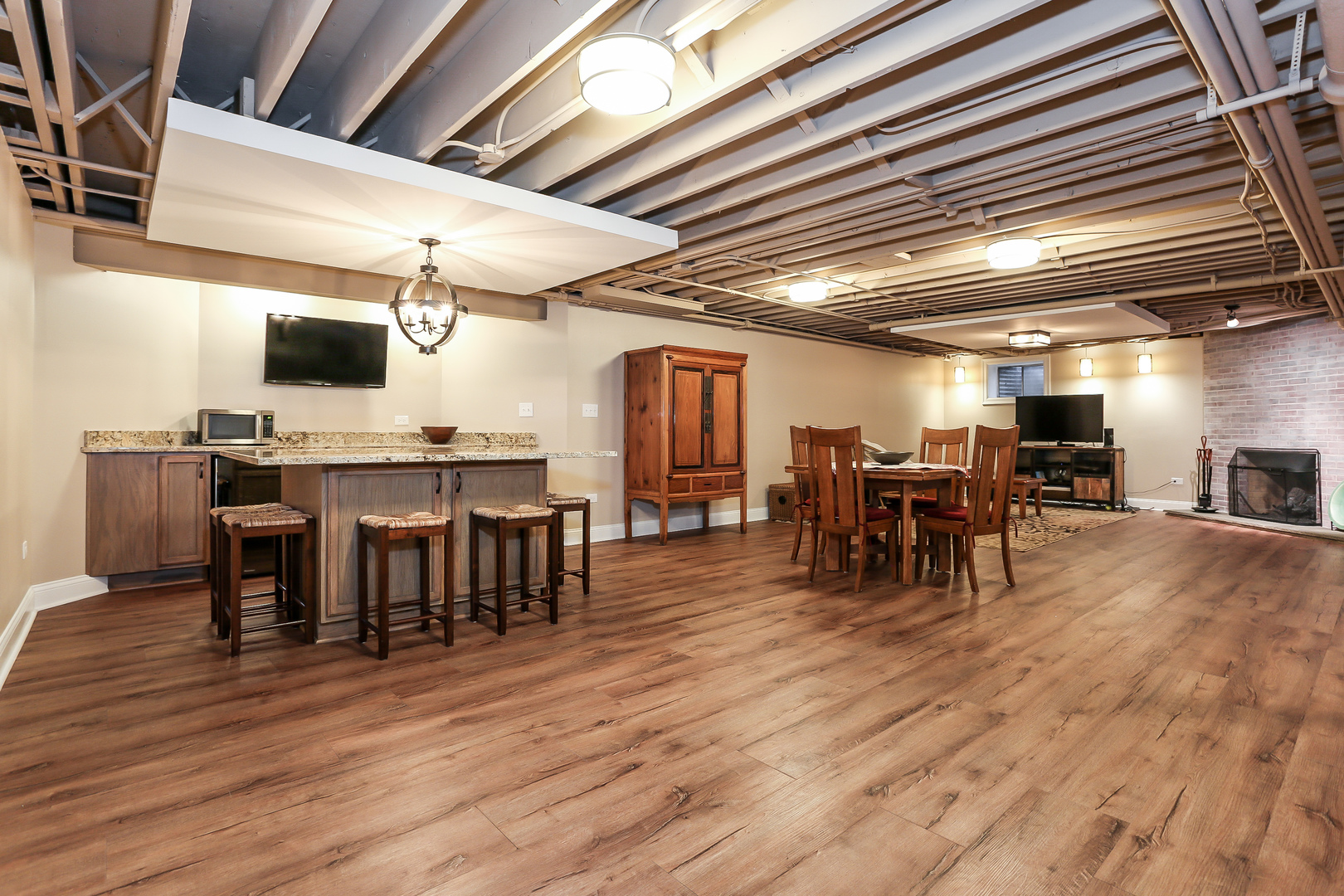 1350 Inverlieth Road Lake Forest, IL 60045 - Photo 29 of 43 a view of a dining room with furniture wooden floor and chandelier