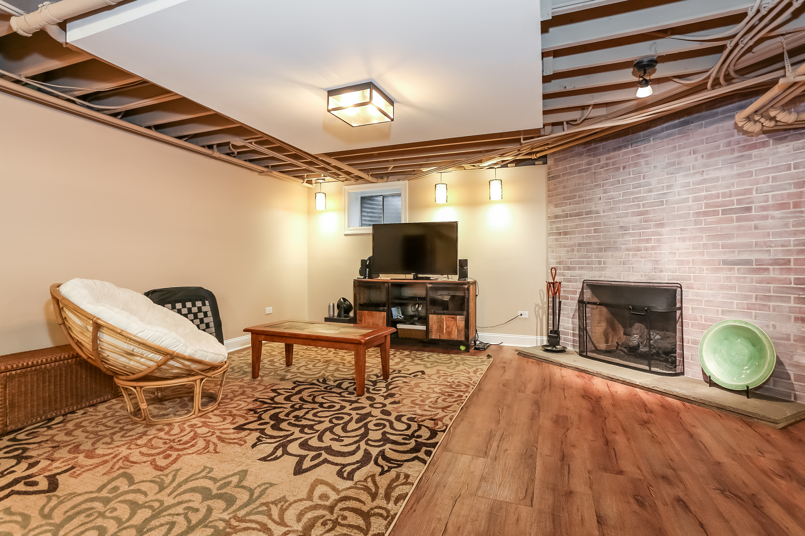 1350 Inverlieth Road Lake Forest, IL 60045 - Photo 32 of 43 a living room with furniture and a fireplace