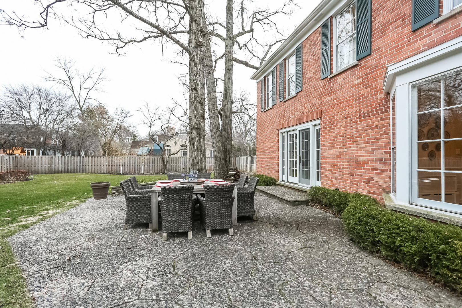 1350 Inverlieth Road Lake Forest, IL 60045 - Photo 36 of 43 a view of a house with backyard and sitting area