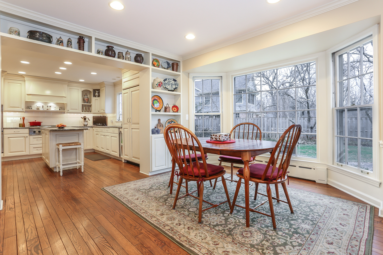 1350 Inverlieth Road Lake Forest, IL 60045 - Photo 8 of 43 a view of a dining room with furniture and wooden floor