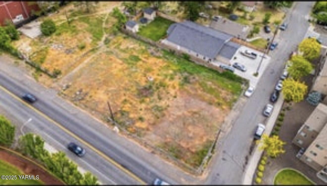 1506 East Beech Street Yakima, WA 98901 - Photo 8 of 8 a aerial view of a house with a swimming pool