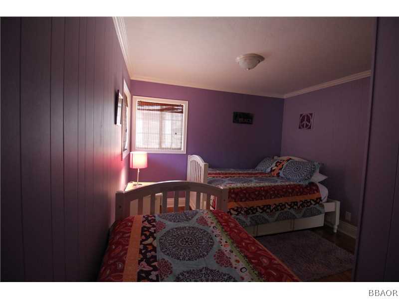 535 Highland Road Big Bear Lake, CA 92315 - Photo 12 of 15 a view of bedroom with furniture and window