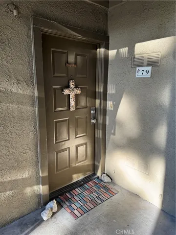 a living room with glass door