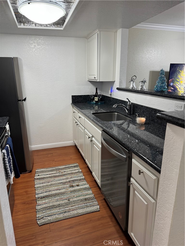 10151 Arrow, Unit 79 Rancho Cucamonga, CA 91730 - Photo 3 of 21 Kitchen with upgraded cabinets and granite countertops