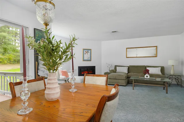 a view of a chair and table in the balcony
