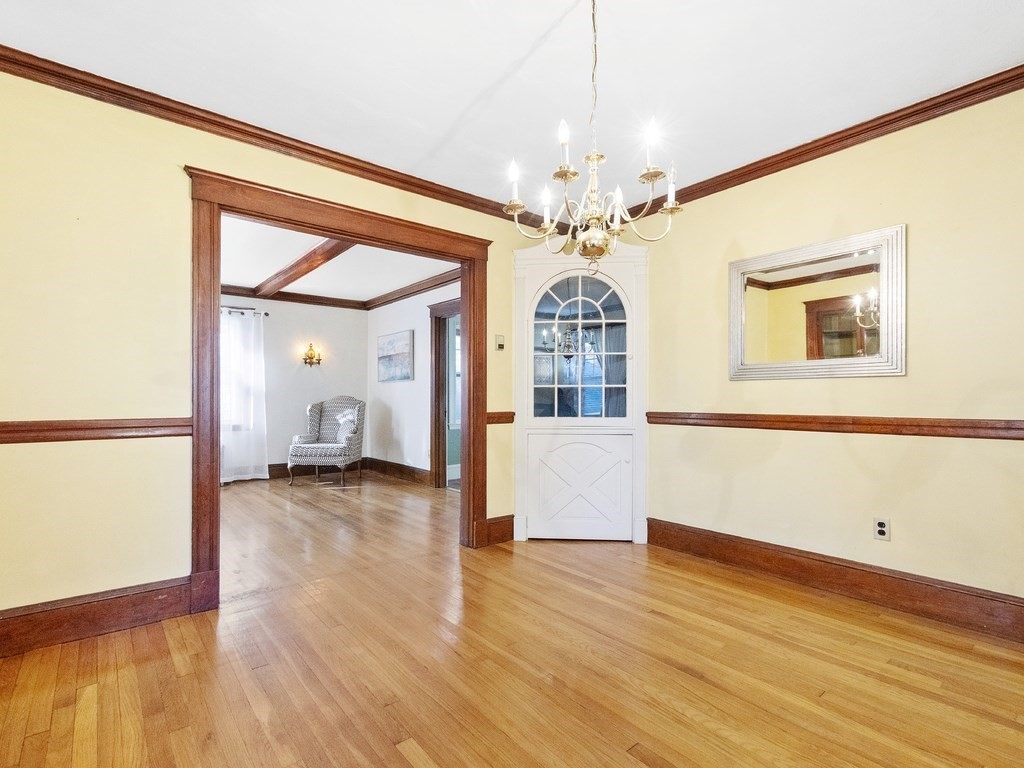 149 Trapelo Road Waltham, MA 02452 - Photo 16 of 36 a view of livingroom with hardwood floor and ceiling fan