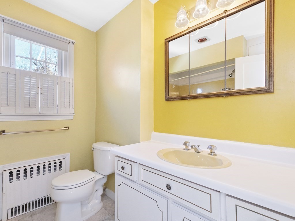 149 Trapelo Road Waltham, MA 02452 - Photo 18 of 36 a bathroom with a sink and a toilet