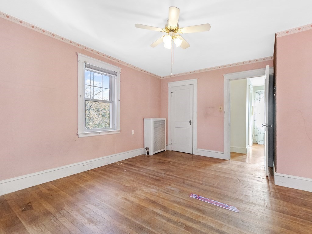 149 Trapelo Road Waltham, MA 02452 - Photo 27 of 36 a view of an empty room with a window