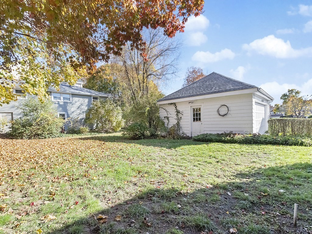 149 Trapelo Road Waltham, MA 02452 - Photo 30 of 36 a backyard of a house with lots of green space