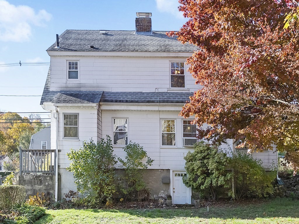 149 Trapelo Road Waltham, MA 02452 - Photo 33 of 36 a front view of a house with a yard and trees