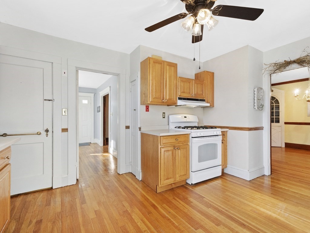 149 Trapelo Road Waltham, MA 02452 - Photo 7 of 36 a view of kitchen with stainless steel appliances granite countertop a stove a sink and a refrigerator