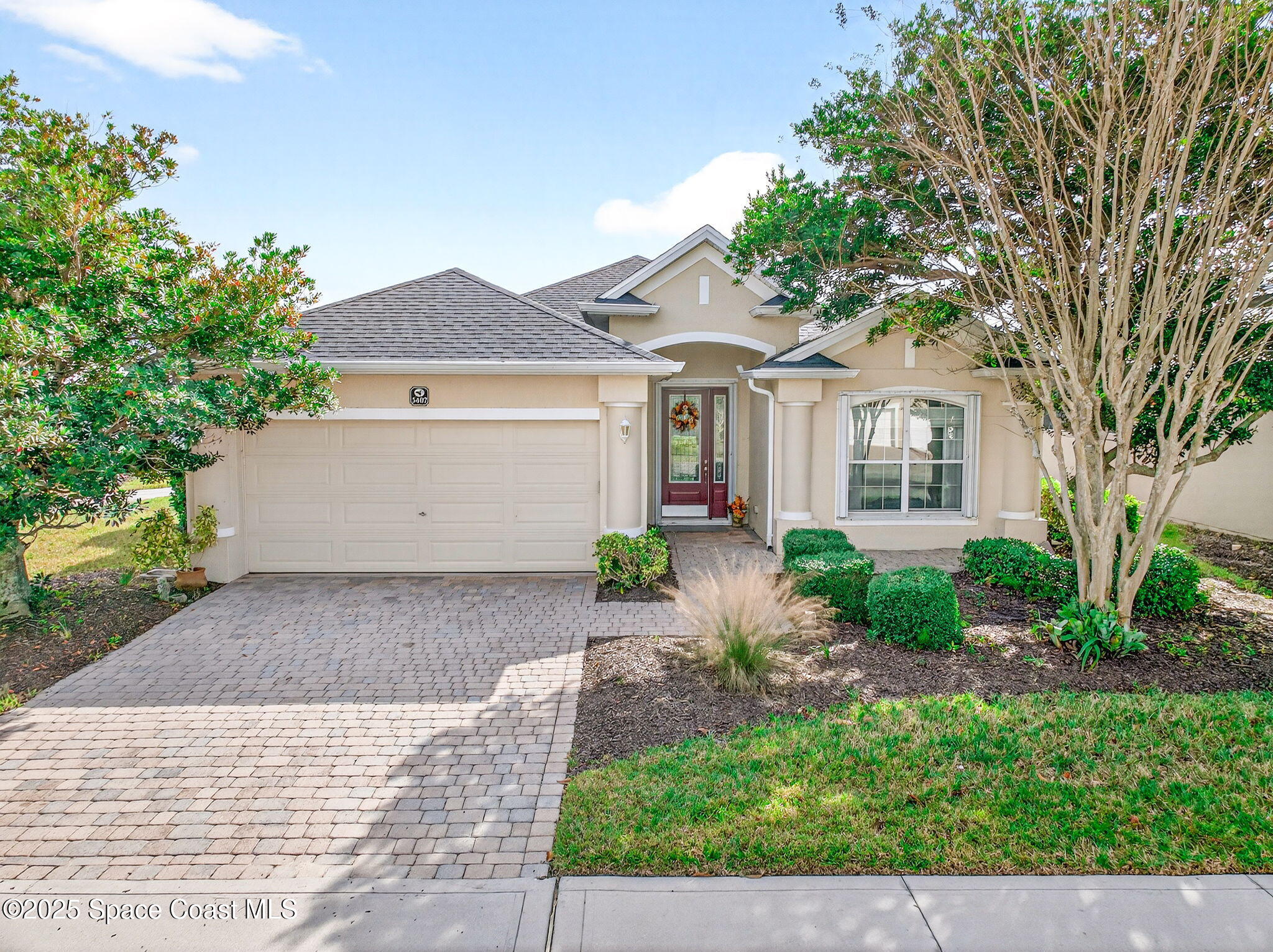 3407 Bancroft Drive Melbourne, FL 32940 - Photo 1 of 74 a front view of a house with garden