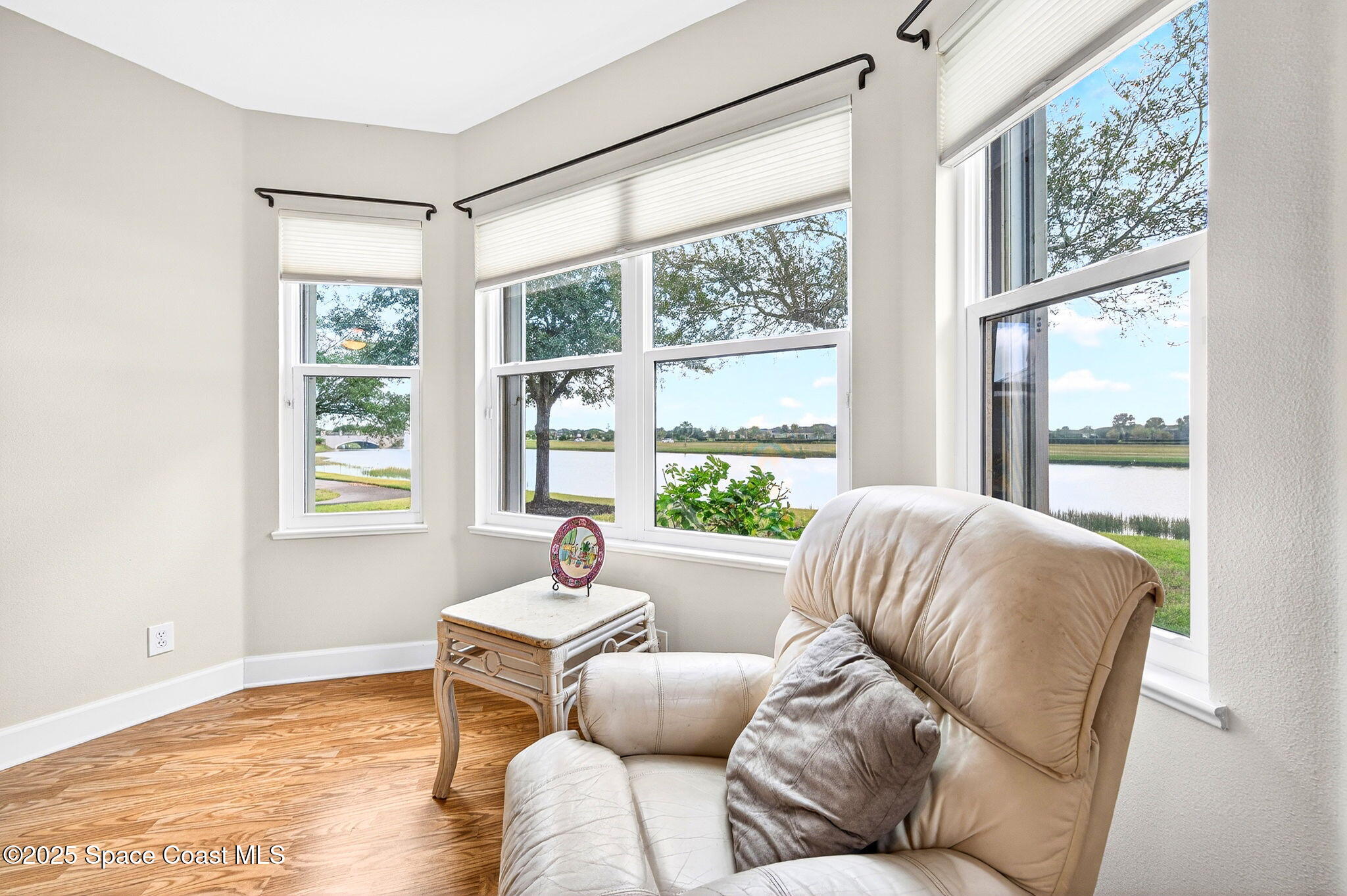 3407 Bancroft Drive Melbourne, FL 32940 - Photo 22 of 74 a living room with furniture and a window