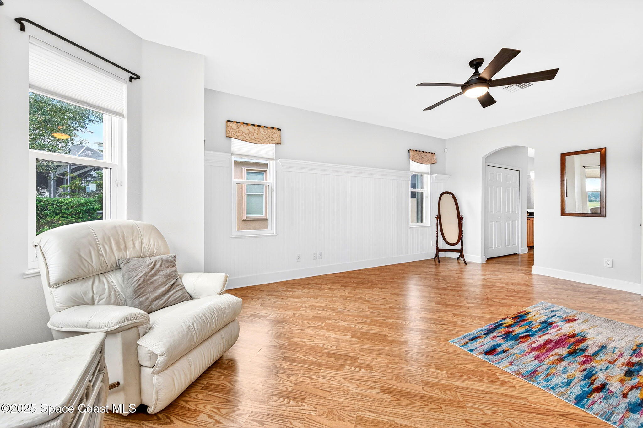 3407 Bancroft Drive Melbourne, FL 32940 - Photo 23 of 74 a living room with furniture and a window
