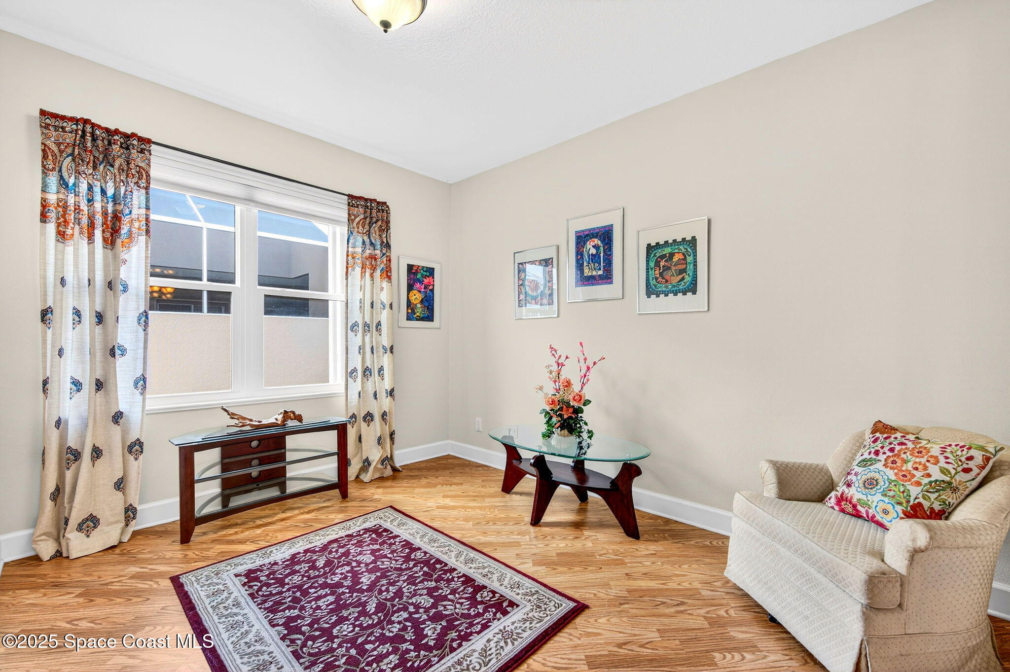 3407 Bancroft Drive Melbourne, FL 32940 - Photo 31 of 74 a living room with furniture and a rug