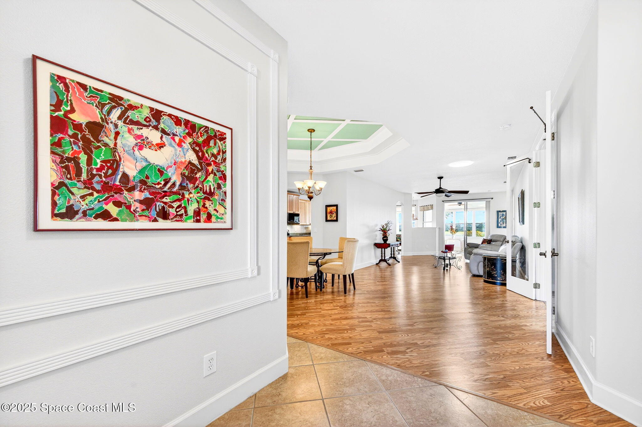 3407 Bancroft Drive Melbourne, FL 32940 - Photo 4 of 74 a living room with furniture and a painting on the wall