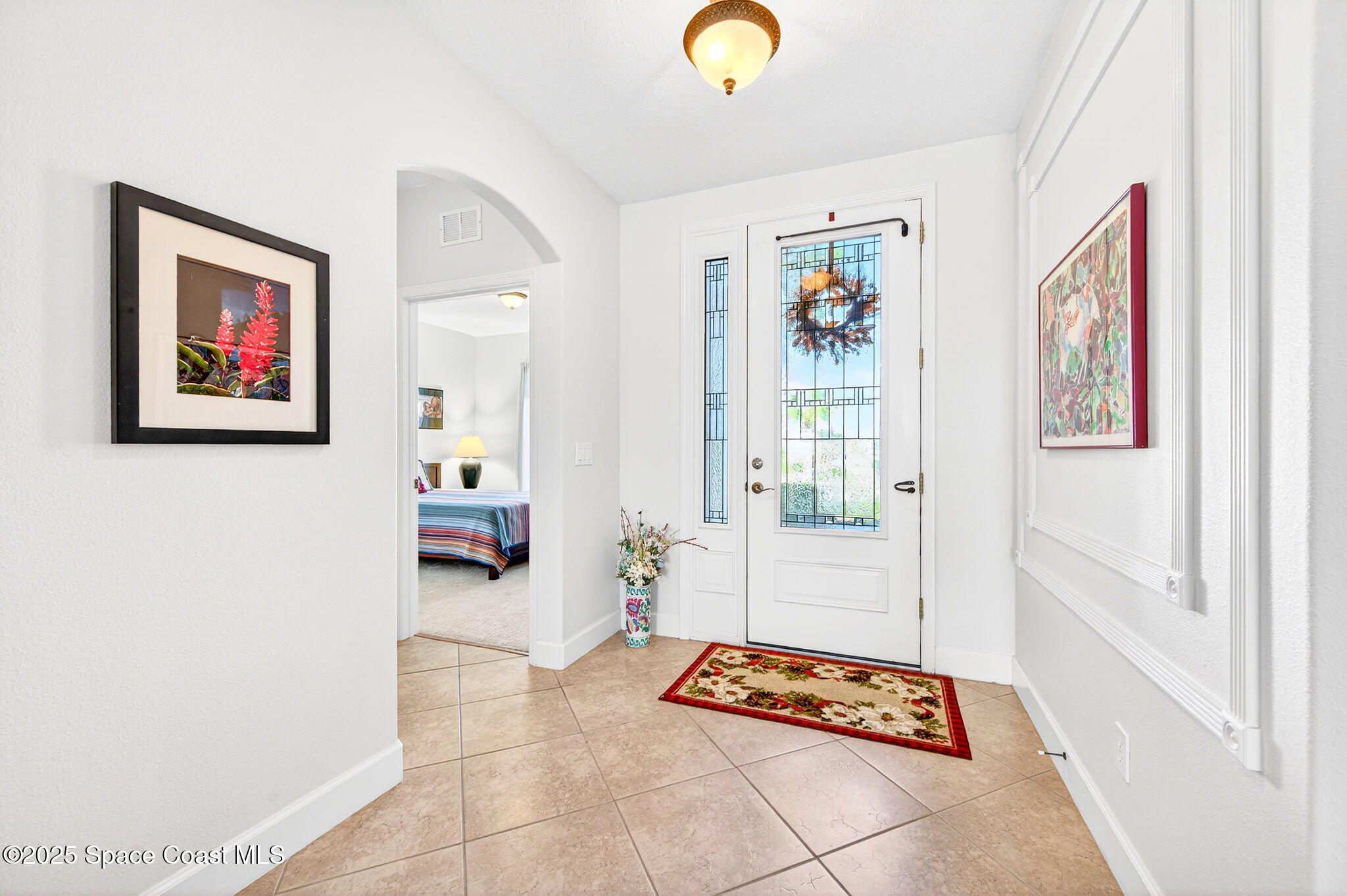 3407 Bancroft Drive Melbourne, FL 32940 - Photo 5 of 74 a living room with furniture and next to a window