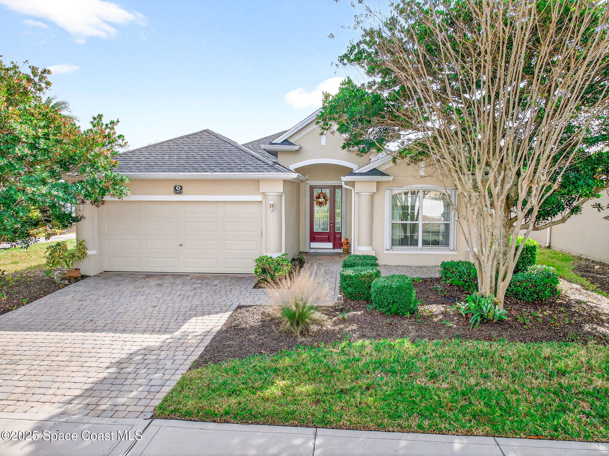 3407 Bancroft Drive Melbourne, FL 32940 - Photo 53 of 74 a front view of a house with garden