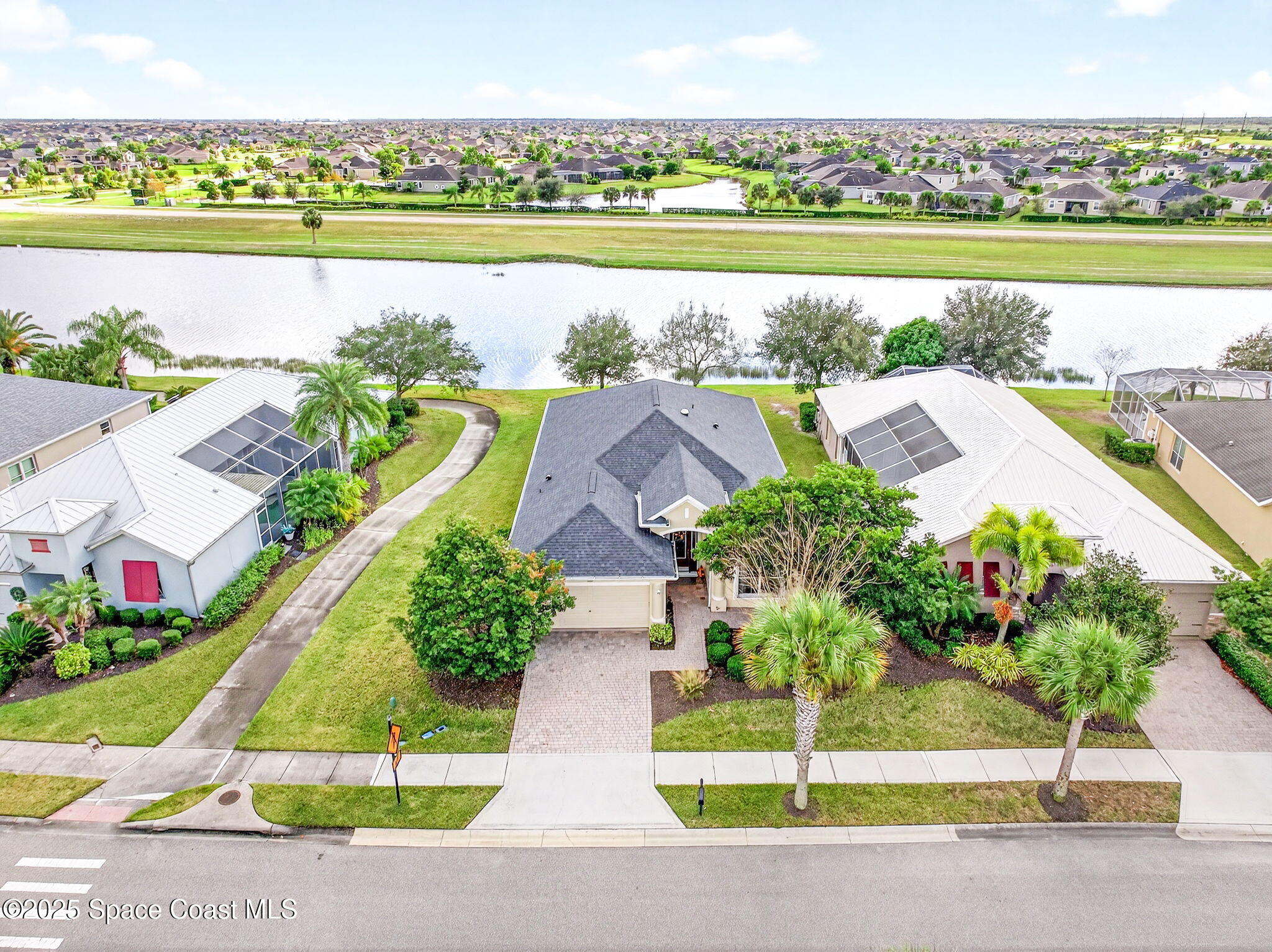 3407 Bancroft Drive Melbourne, FL 32940 - Photo 58 of 74 a view of a city with an ocean view