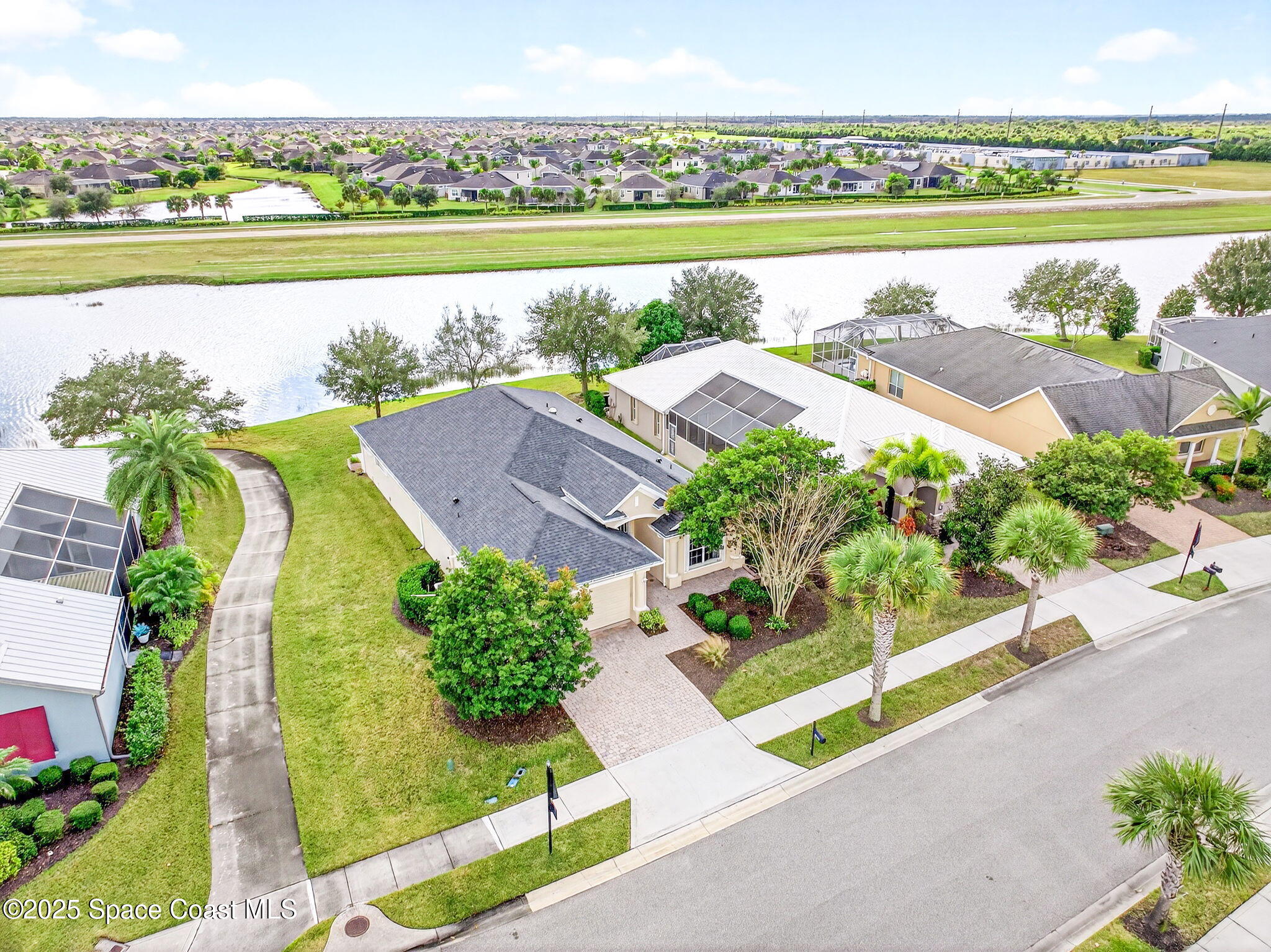 3407 Bancroft Drive Melbourne, FL 32940 - Photo 59 of 74 a view of a city with an ocean view