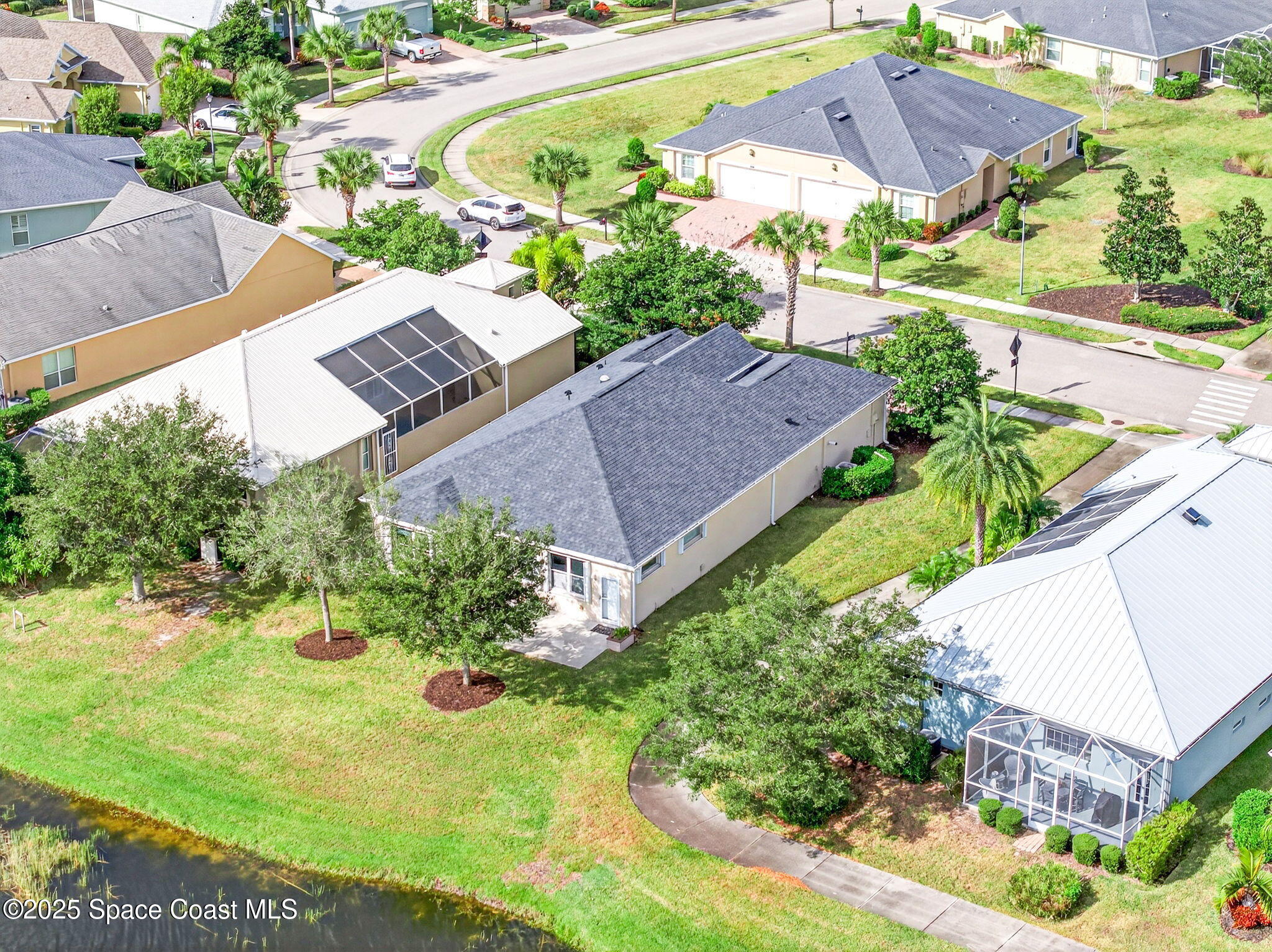 3407 Bancroft Drive Melbourne, FL 32940 - Photo 64 of 74 an aerial view of house with yard