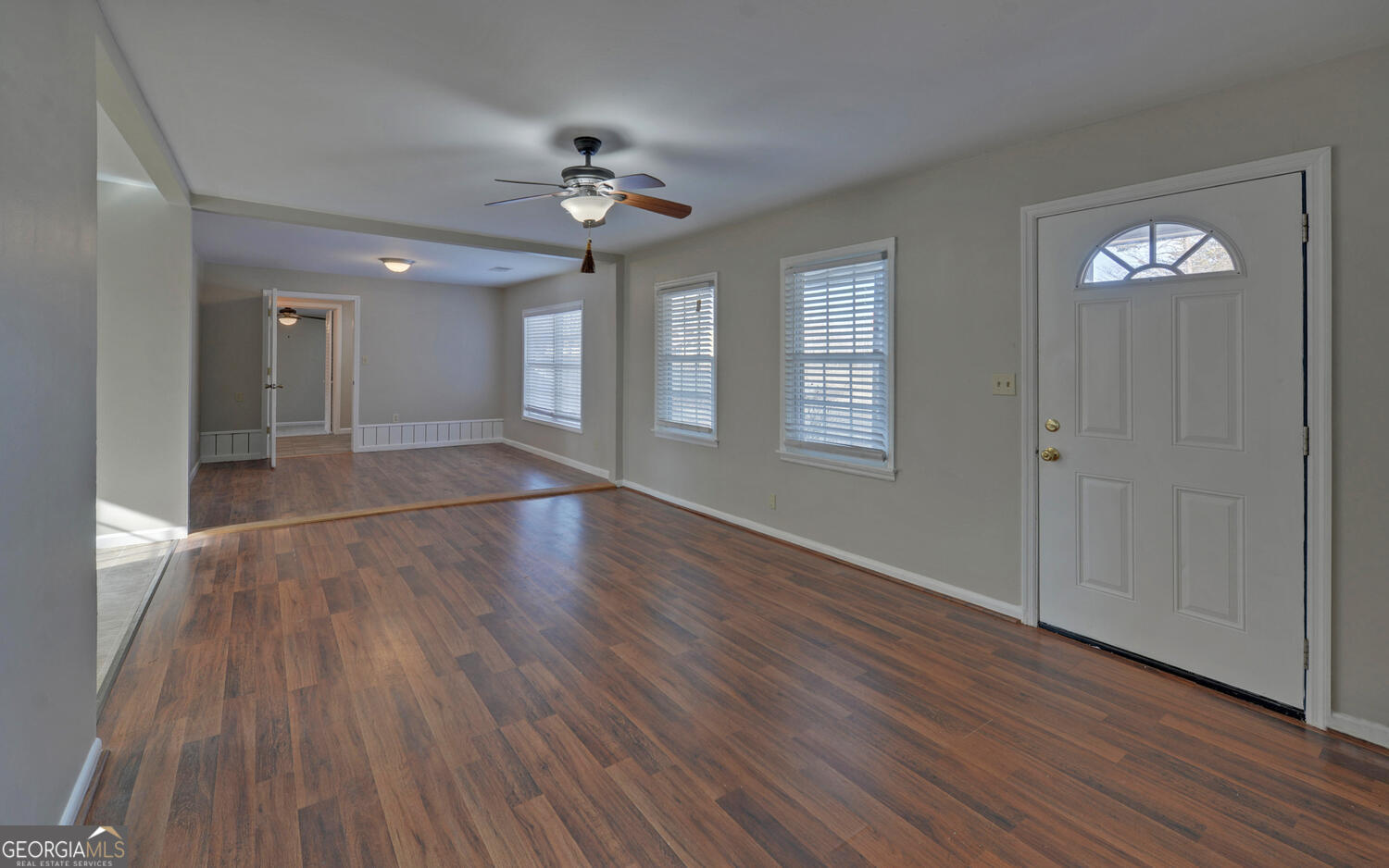 297 East Leatherwood Road Toccoa, GA 30577 - Photo 14 of 37 a view of an empty room with wooden floor and a window