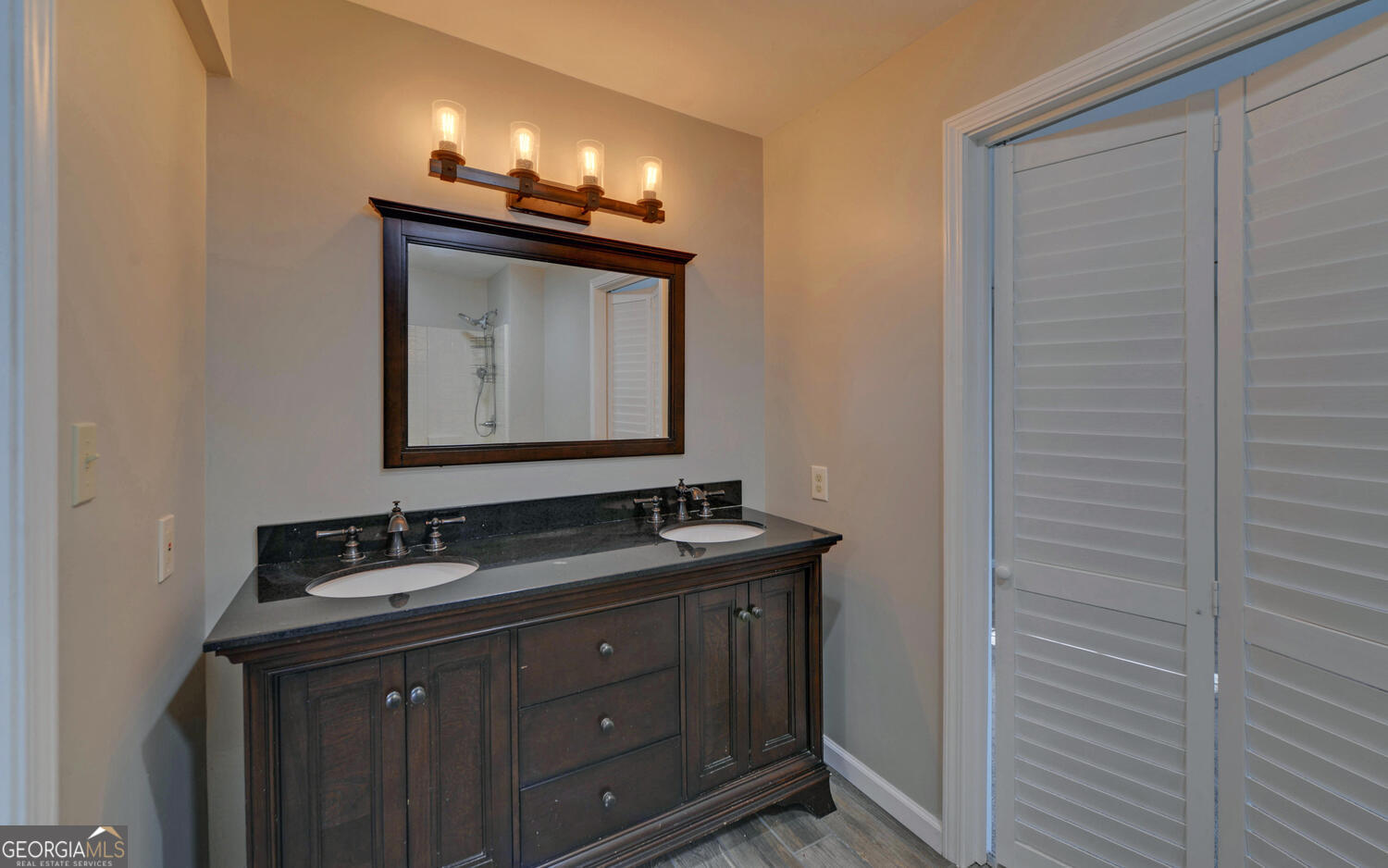 297 East Leatherwood Road Toccoa, GA 30577 - Photo 15 of 37 a bathroom with a sink and a mirror