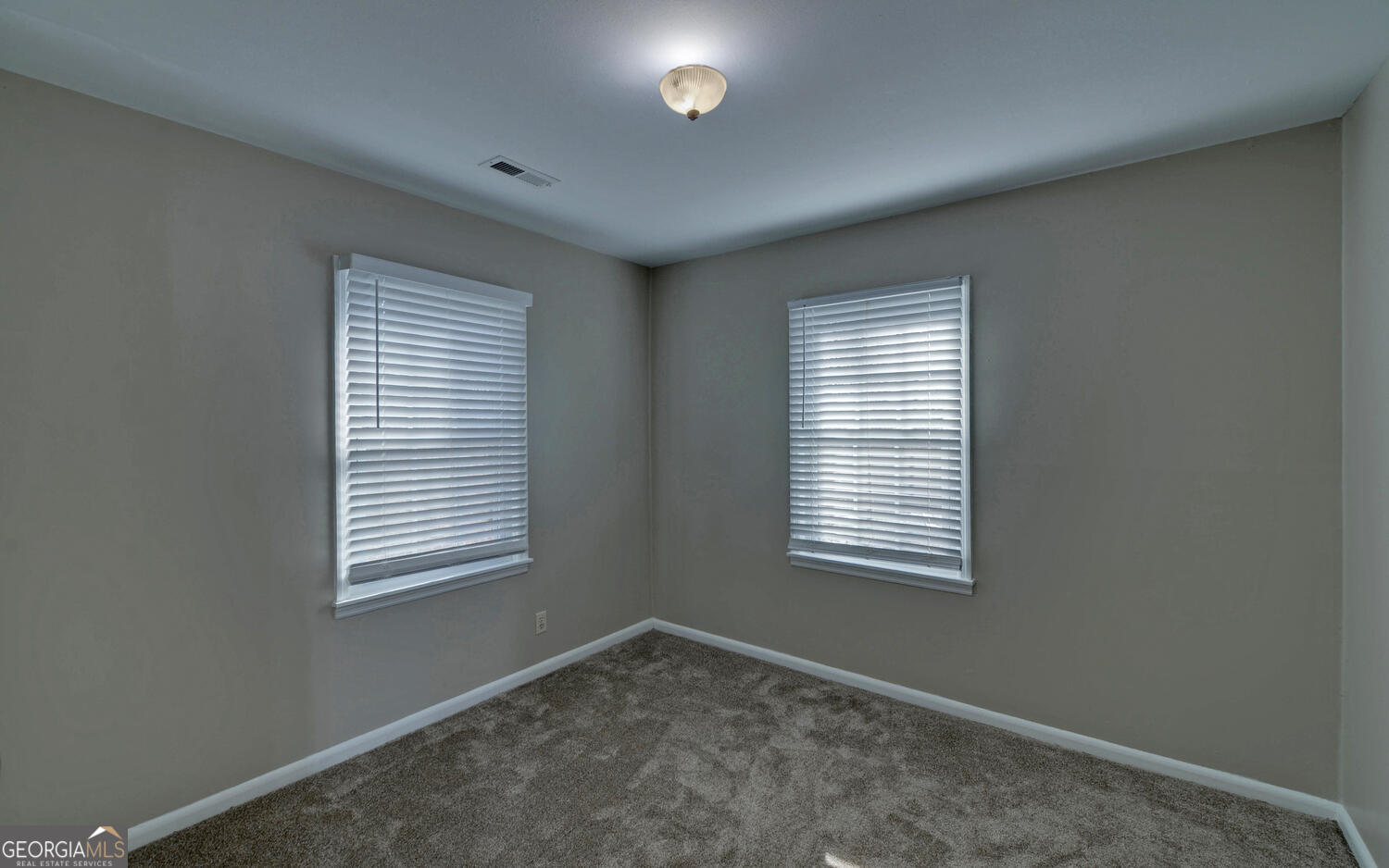297 East Leatherwood Road Toccoa, GA 30577 - Photo 19 of 37 an empty room with a window