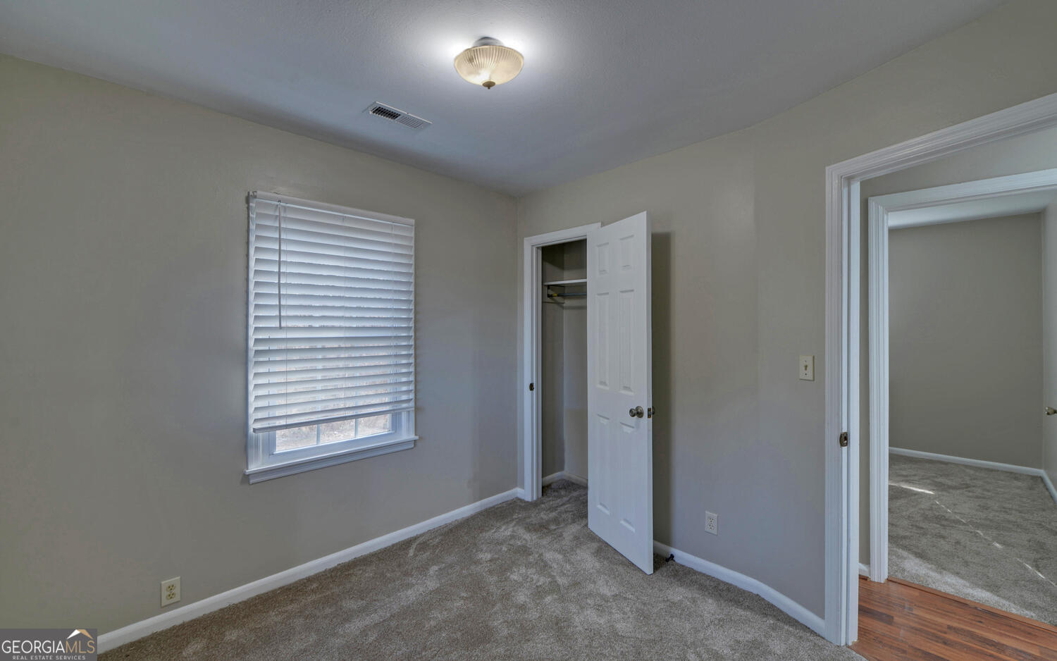 297 East Leatherwood Road Toccoa, GA 30577 - Photo 21 of 37 an empty room with windows