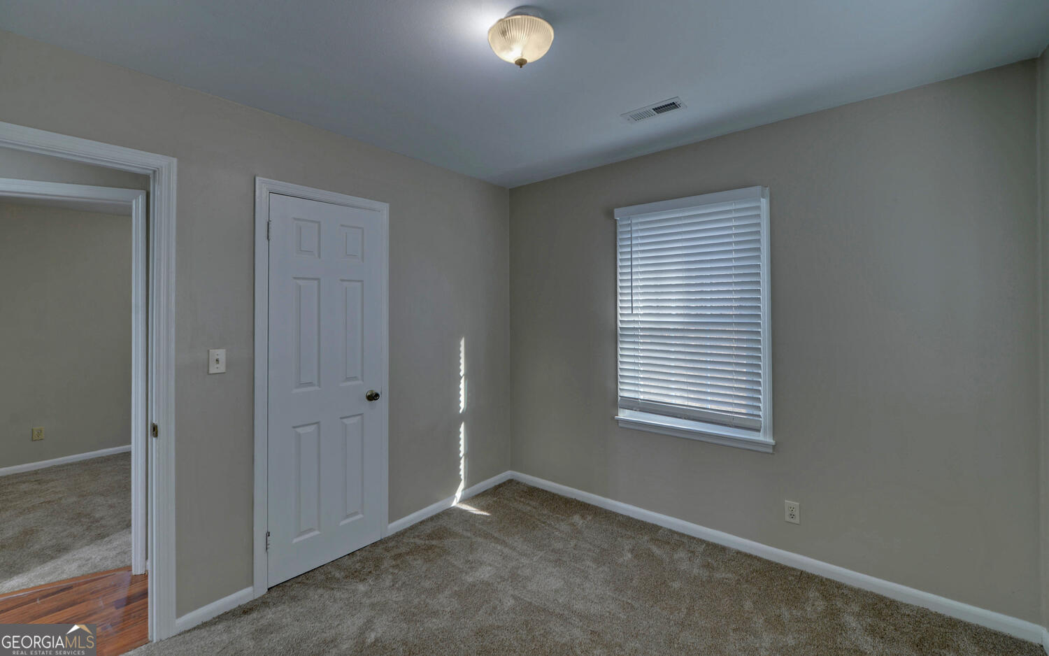 297 East Leatherwood Road Toccoa, GA 30577 - Photo 22 of 37 a view of an empty room with window and closet area