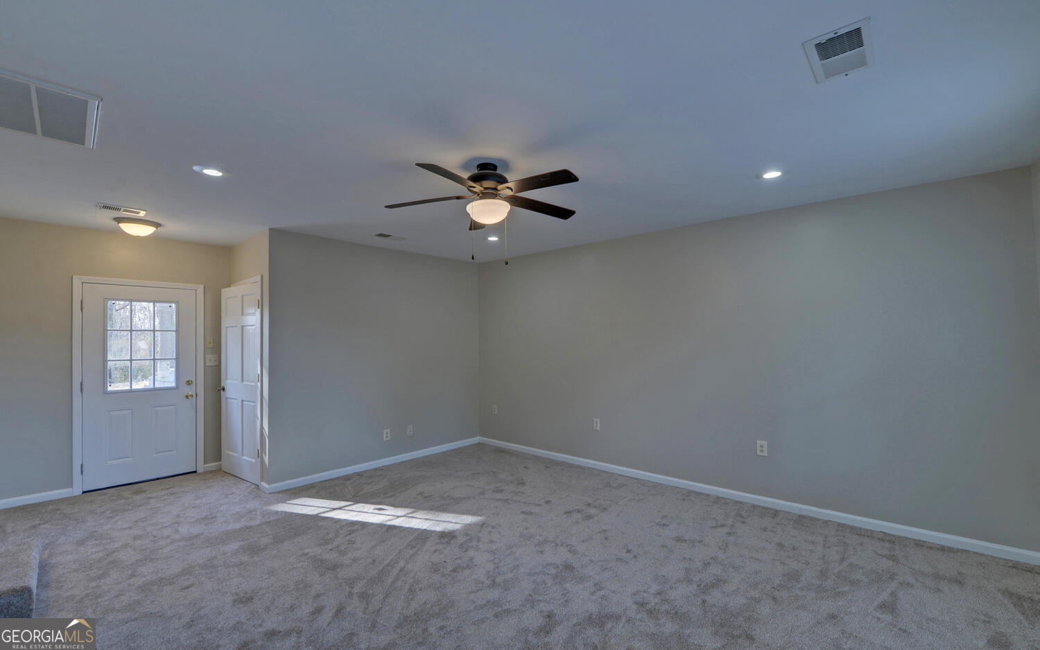 297 East Leatherwood Road Toccoa, GA 30577 - Photo 27 of 37 an empty room with closet and windows