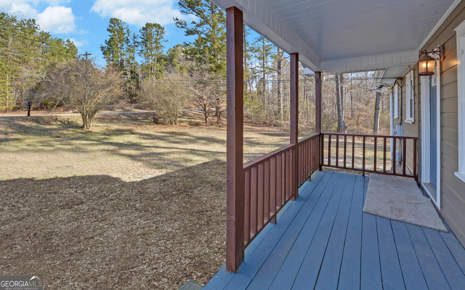 297 East Leatherwood Road Toccoa, GA 30577 - Photo 5 of 37 a view of a balcony with wooden floor
