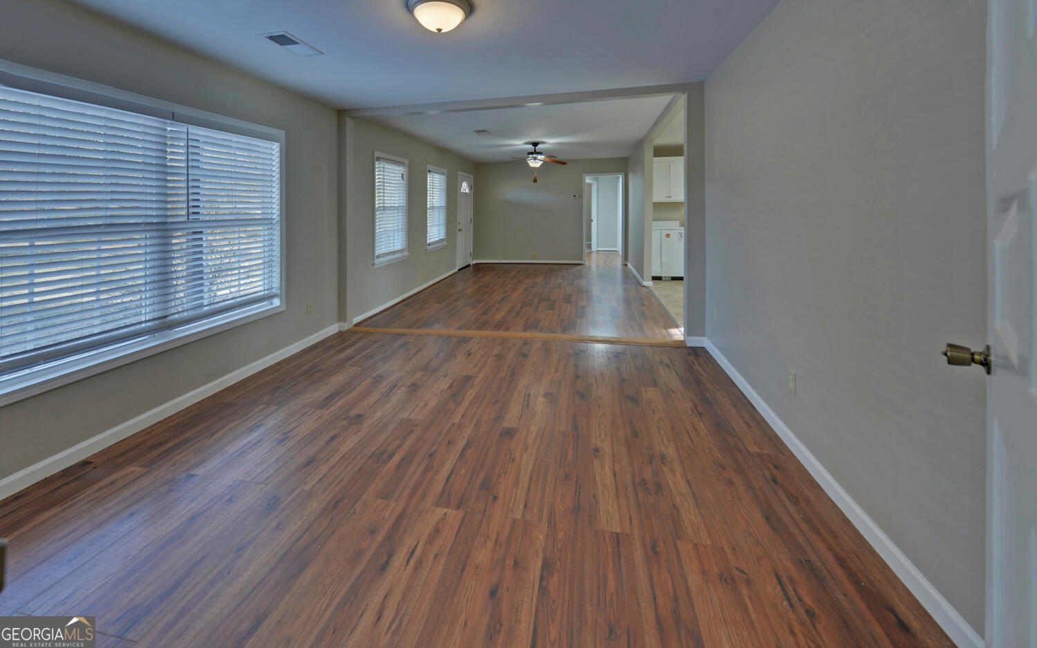 297 East Leatherwood Road Toccoa, GA 30577 - Photo 6 of 37 a view of a room with wooden floor and windows