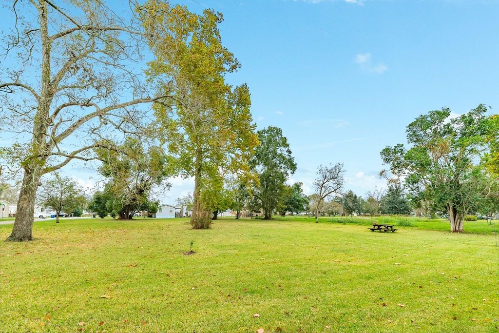 404 Chestnut Street Brazoria, TX 77422 - Photo 22 of 23 a view of swimming pool with an outdoor space and seating area