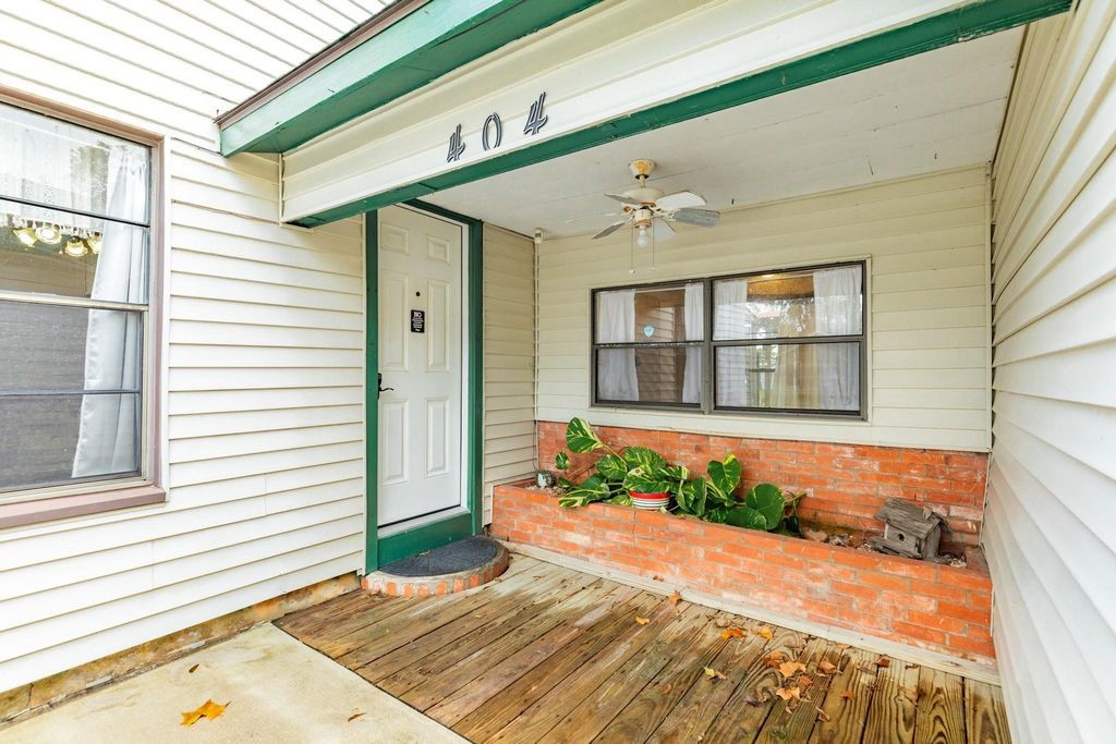 404 Chestnut Street Brazoria, TX 77422 - Photo 5 of 23 a front view of a house with a yard