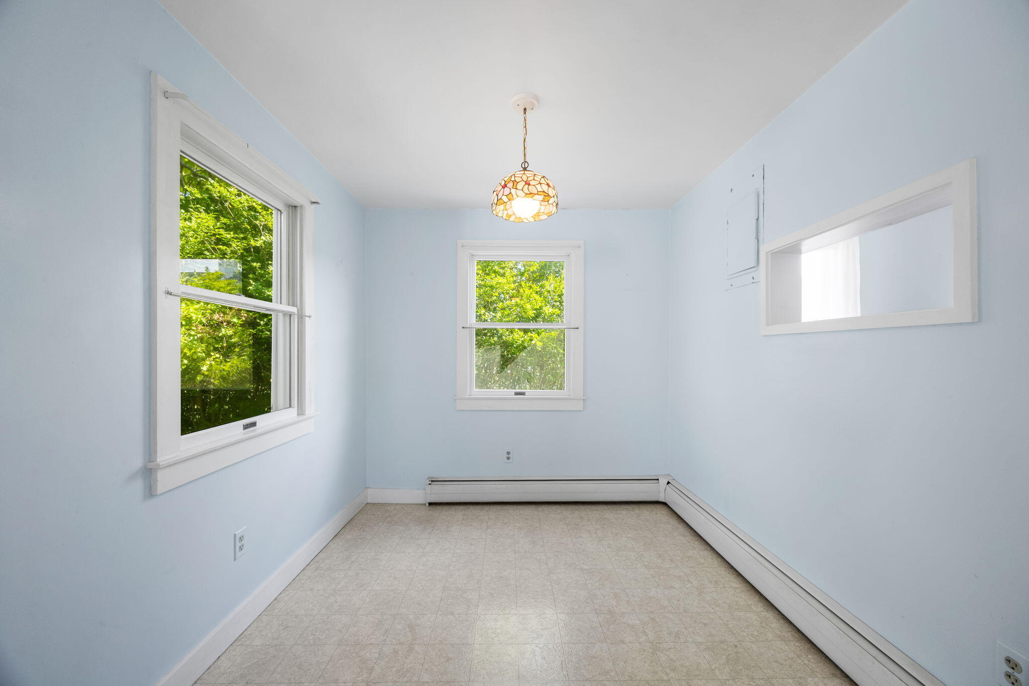 9 Harrison Avenue Buzzards Bay, MA 02532 - Photo 15 of 47 an empty room with windows and natural light
